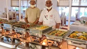 A buffet setup with multiple food stations, including salads, pasta, and other dishes. - Ecrin Club  (Hammamet)