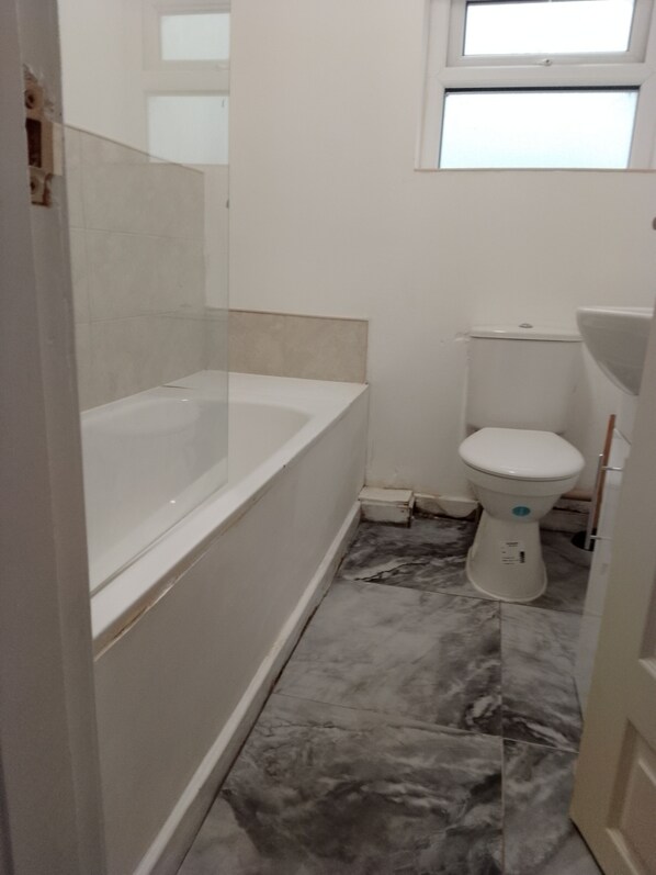 Bidet, soap, toilet paper