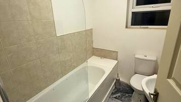 Bidet, soap, toilet paper
