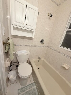 Hair dryer, towels, soap, toilet paper