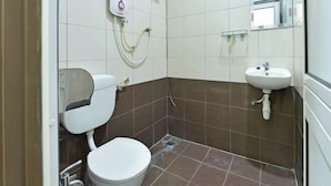 A bathroom with a toilet, shower, and sink. - Hotel O Pendang Lake Formerly D Jiwa (Pendang)