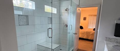 Shower, towels, soap, toilet paper