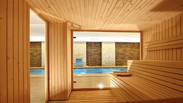 A wooden sauna room with a bench, a stone wall, and a view of an outdoor pool.