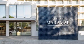 The exterior of Maramar Hotel with a large tiled wall displaying the hotel's name. - Estival Maramar (El Vendrell)