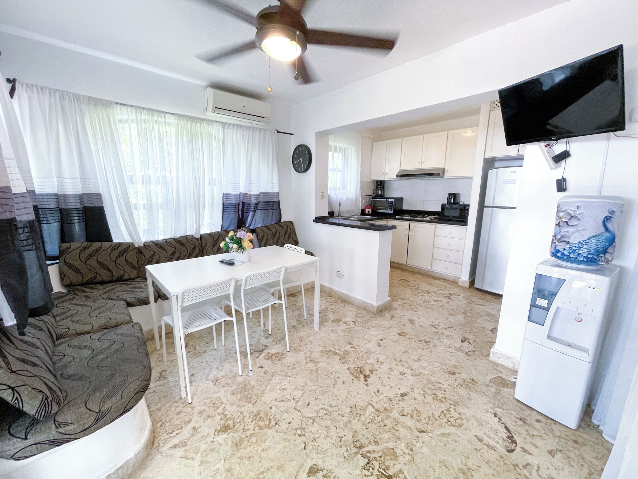 Family Villa, 3 Bedrooms, Patio | Living area | 32-inch LCD TV with cable channels