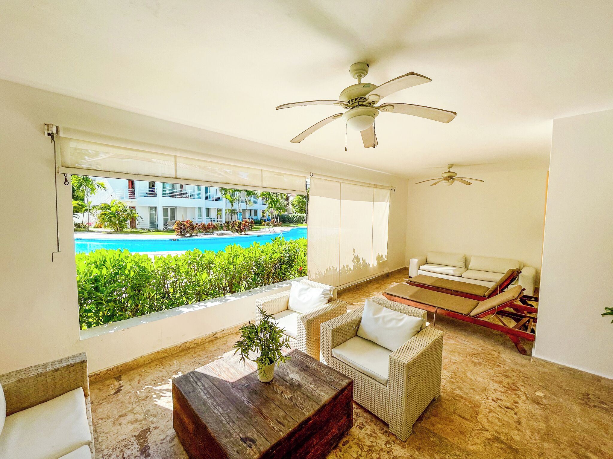 Exclusive Apartment, 2 Bedrooms, Poolside | Living area | 32-inch LCD TV with cable channels