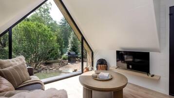 Cabana superluxo, vista para o jardim | Cortinas blackout, Wi-Fi de cortesia, roupa de cama