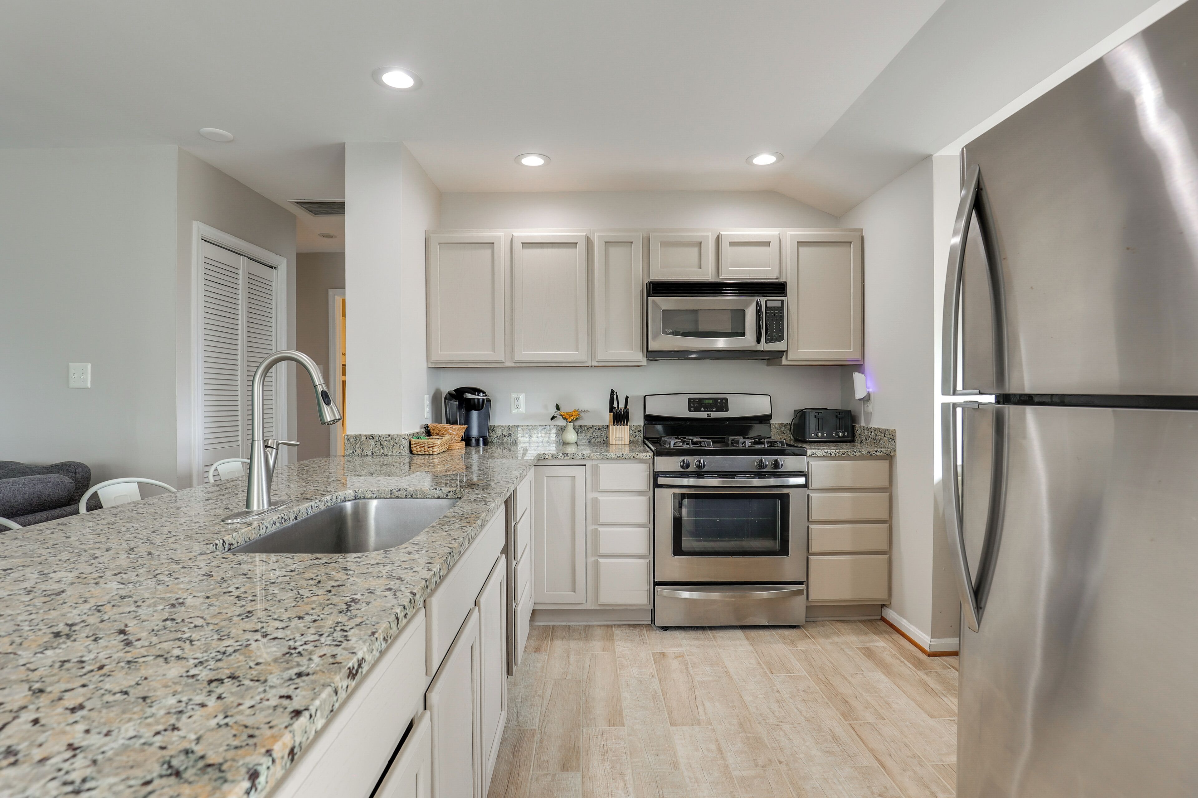 Fridge, microwave, stovetop, coffee/tea maker