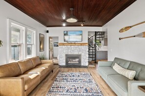 Smart TV, fireplace, books