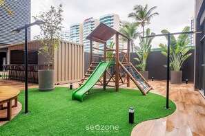 Children’s area - Beachfront Building With Pool and gym - Arus (Salvador)