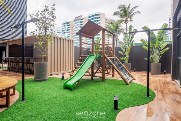 Children’s area - Beachfront Building With Pool and gym - Arus (Salvador)