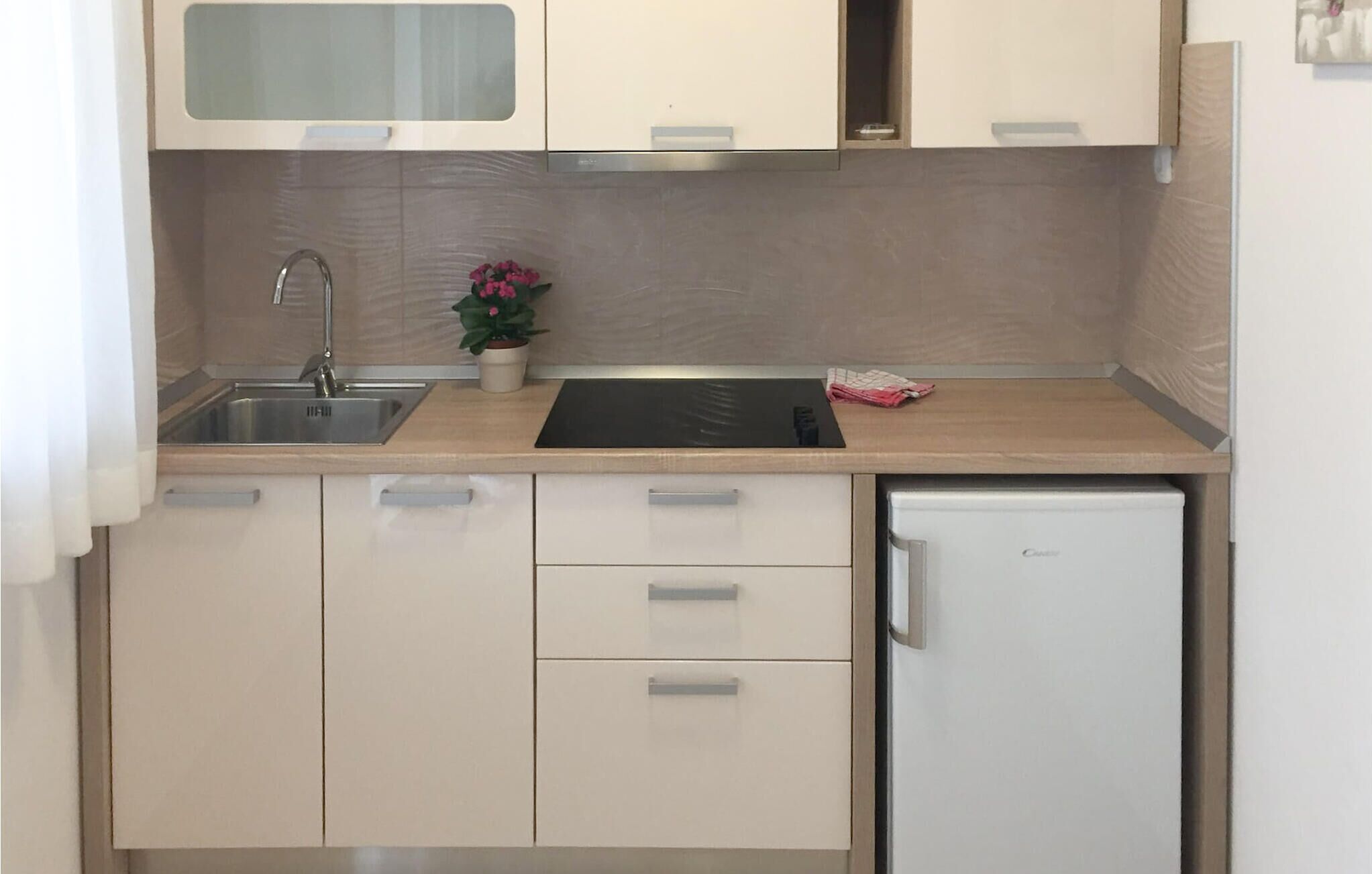 Fridge, oven, coffee/tea maker, cookware/dishes/utensils