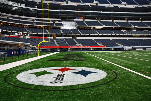 A stadium with multiple tiers of seating, a large field with a Steelers logo, and a visible scoreboard. - Staybridge Suites Pittsburgh Airport, an IHG Hotel (Pittsburgh)