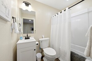 Hair dryer, towels, soap, shampoo