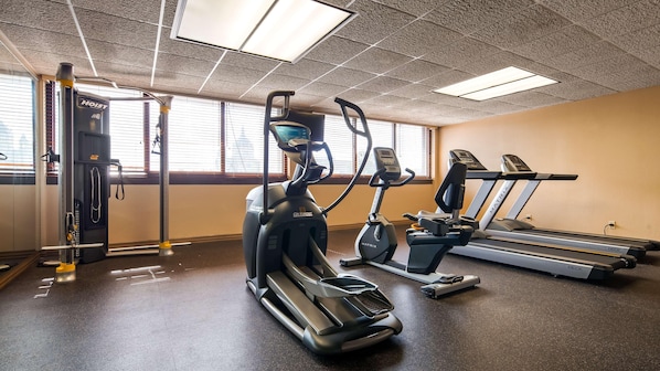 A gym with treadmills, an elliptical, and a stationary bike. - Radisson Hotel St. Paul Downtown (St. Paul)