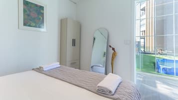 Apartment, 2 Bedrooms, Kitchenette, City View | Blackout curtains, iron/ironing board, free WiFi