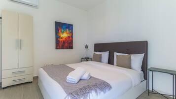 Apartment, 2 Bedrooms, Kitchenette, City View | Blackout curtains, iron/ironing board, free WiFi