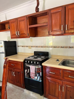 Departamento junior | Cocina privada | Microondas y utensilios de cocina