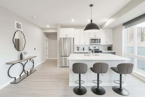 Fridge, microwave, oven, stovetop - Luxury 2BR Uptown Retreat | Steps from Bde Maka (Minneapolis)