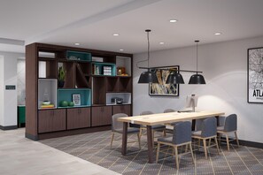 A modern meeting room with a wooden table, four chairs, a bookshelf, and a pendant light.