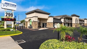 A Best Value Inn with a sign indicating a price of $299 per night. - Americas Best Value Inn Orlando (Orlando)