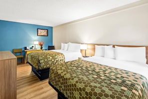 A hotel room with two beds, a desk, a chair, and a lamp. - Econo Lodge Augusta North - Washington Road (Augusta)