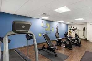 A gym with treadmills, an elliptical, and a stationary bike. - Best Western Grantville/hershey (Grantville)