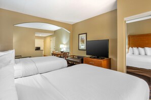 A hotel room with two beds, a desk with a chair, a television, and a mirror. - Best Western Grantville/hershey (Grantville)