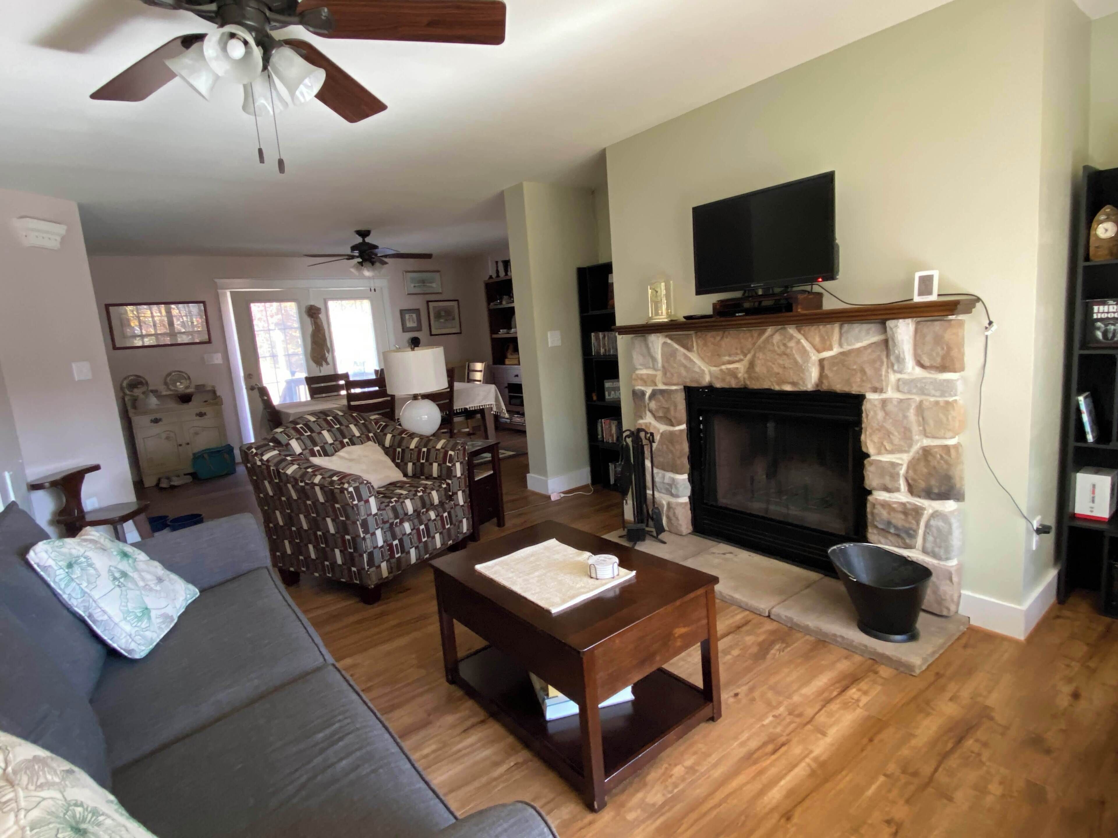 Smart TV, fireplace, DVD player, books