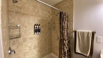 Shower, jetted tub, hair dryer, towels