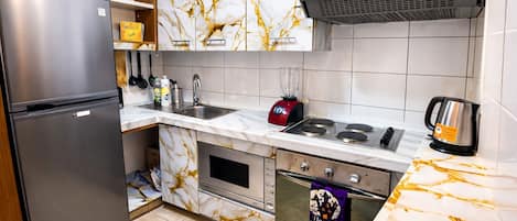 Fridge, microwave, oven, stovetop