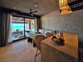 Deluxe Studio Suite, Sea View | Living room | Smart TV