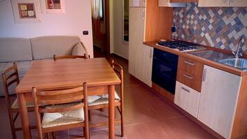 Cofres nos quartos, ferros/tábuas de passar roupa