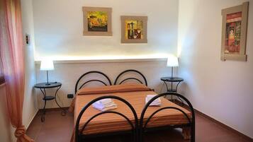 Cofres nos quartos, ferros/tábuas de passar roupa