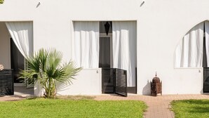 A building with multiple arched windows and a flat roof. - Amareclub Baia Dei Turchi Resort - Adults Only (Otranto)