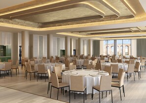 A spacious banquet hall with round tables and chairs, high ceilings with recessed lighting, and large windows offering views of the outdoors. - Hyatt Regency Rome Central (Rome)