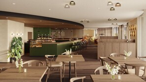 Een modern restaurant met een bar, houten tafels en stoelen, en een groene accentmuur.