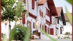 A traditional European-style building with a steeply pitched roof and wooden shutters. - IRIBURU-BERRIA - SARE (SARE)