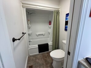 Bidet, towels, soap, toilet paper