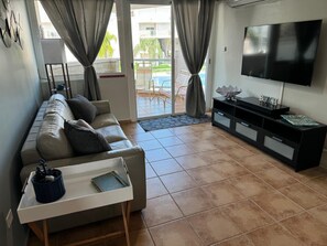 Living area - Relaxing beachfront retreat, pool view balcony near Rainforest El Yunque (Río Grande)