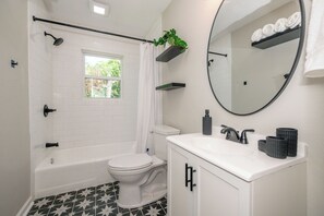 Hair dryer, towels, soap, toilet paper