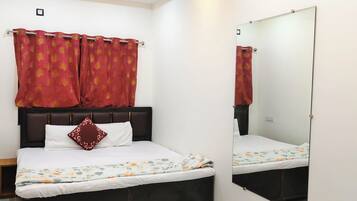 Family Room, Balcony, City View | Free WiFi