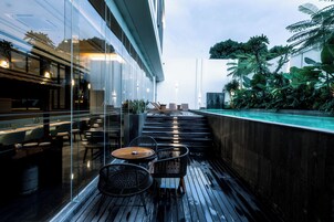 Outdoor pool, open 6:00 AM to 7:00 PM, pool umbrellas, sun loungers