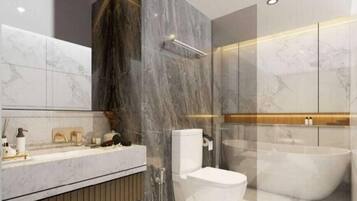 Sèche-cheveux, chaussons, serviettes fournies, savon