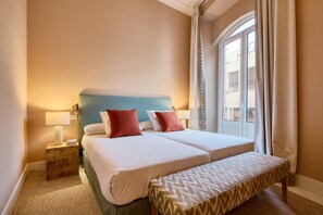 Iron/ironing board, travel crib, free WiFi, bed sheets