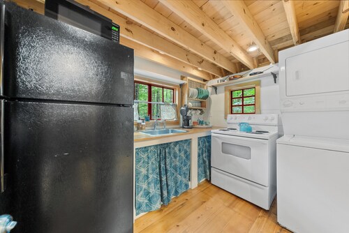 The Brick Cottage with Cozy Cabin
 in the woods!