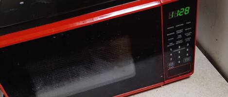 A microwave on a kitchen counter.