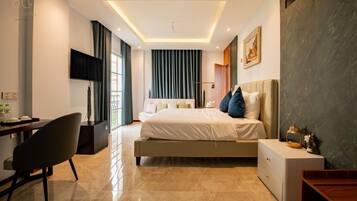 Deluxe Triple Room, Balcony, City View | Desk, laptop workspace, free WiFi, bed sheets