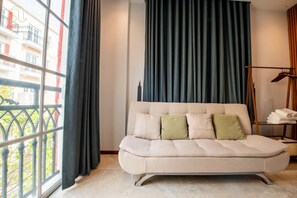 Deluxe driepersoonskamer, balkon, uitzicht op stad | Kameruitzicht