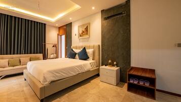 Deluxe Triple Room, Balcony, City View | Desk, laptop workspace, free WiFi, bed sheets